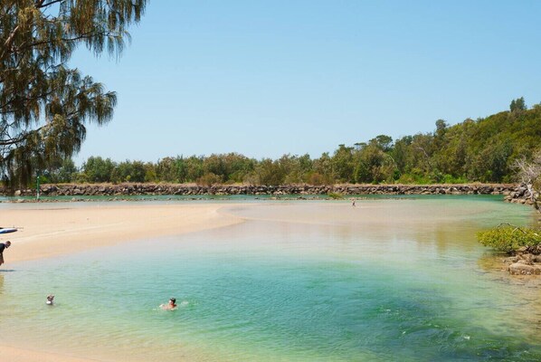 On the beach, sun-loungers, beach towels