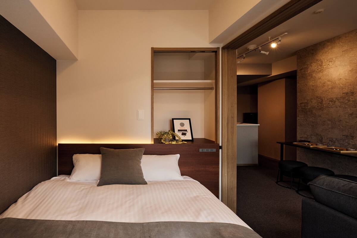 Habitación superior | Escritorio, wifi gratis, ropa de cama