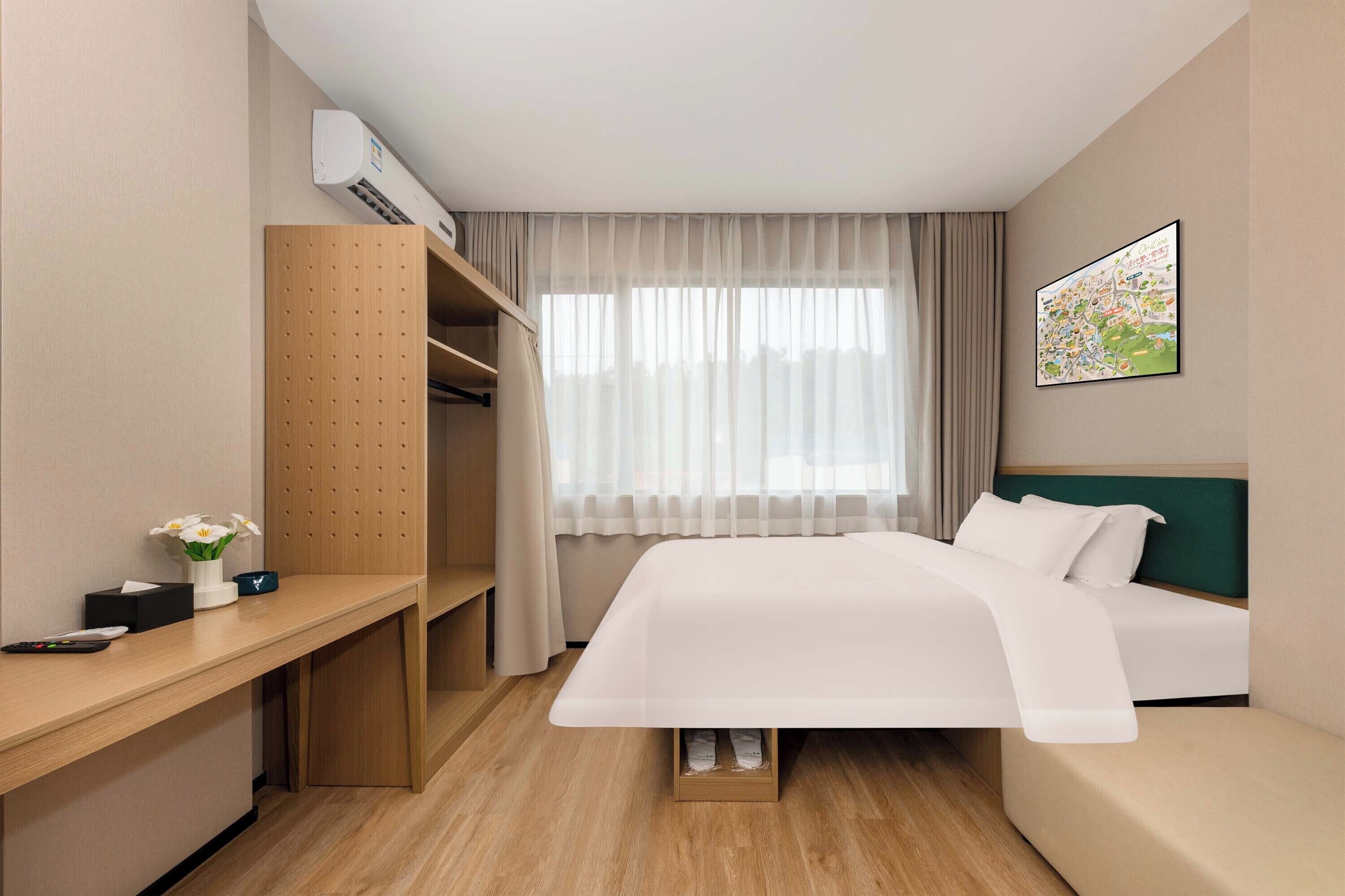 スーペリア ダブルルーム ヒルビュー | リビング エリア | テレビ、テーブルサッカー台、書庫