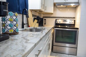 Microwave, oven, stovetop, paper towels - Spacious Providence Retreat 2BD Condo w/Central Air & Ample Parking-Perfect Stay (Providence)