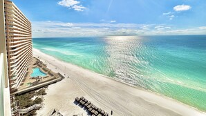 A beachfront hotel with a pool, beach, and ocean view. - Beachfront 1BR + Bunks Condo w/ Pools Sleeps 6! (Panama City Beach)