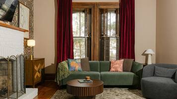 TV, fireplace, books