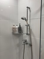 Shower, free toiletries, hair dryer, slippers