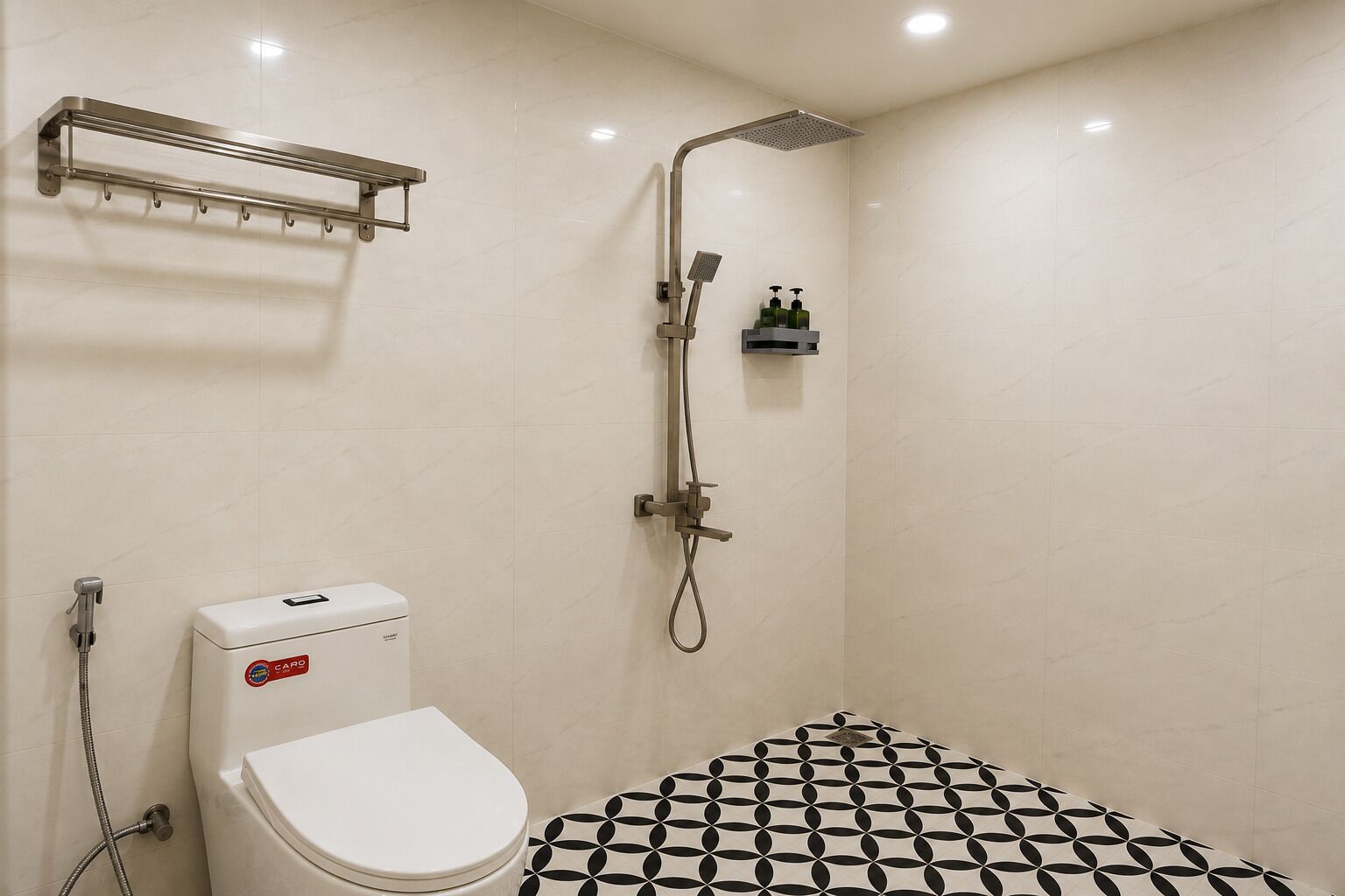 A bathroom with a toilet, a shower, and a sink.