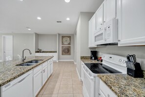 Fridge, oven, stovetop, dishwasher - Spacious Fun Retreat with Private Pool and Game Room near Disney and WaterPark. (Kissimmee)