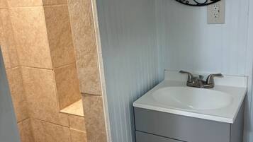 Shower, towels, soap, toilet paper