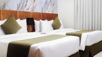 Free minibar, in-room safe, desk, blackout curtains