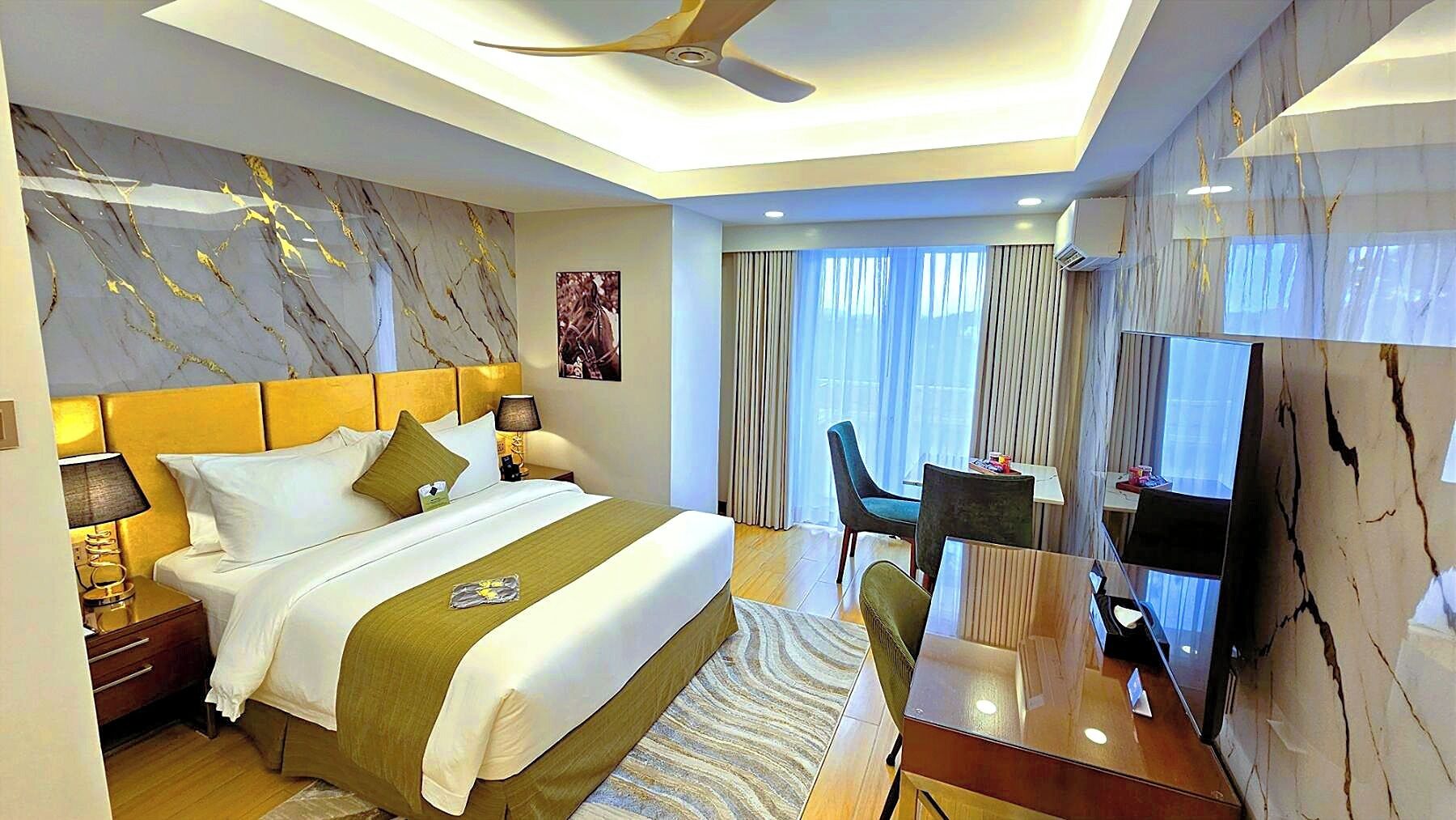 Free minibar, in-room safe, desk, blackout curtains