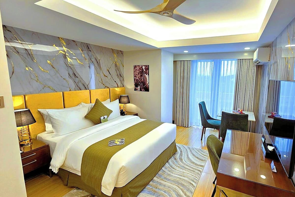 Free minibar, in-room safe, desk, blackout curtains