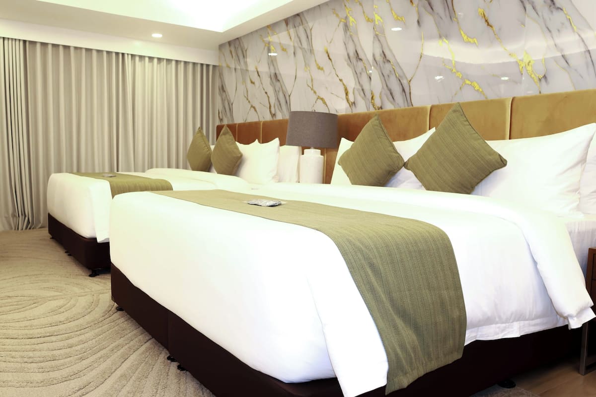 Family Studio, Multiple Beds | Free minibar, in-room safe, desk, blackout curtains