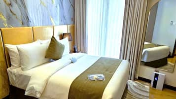 Free minibar, in-room safe, desk, blackout curtains