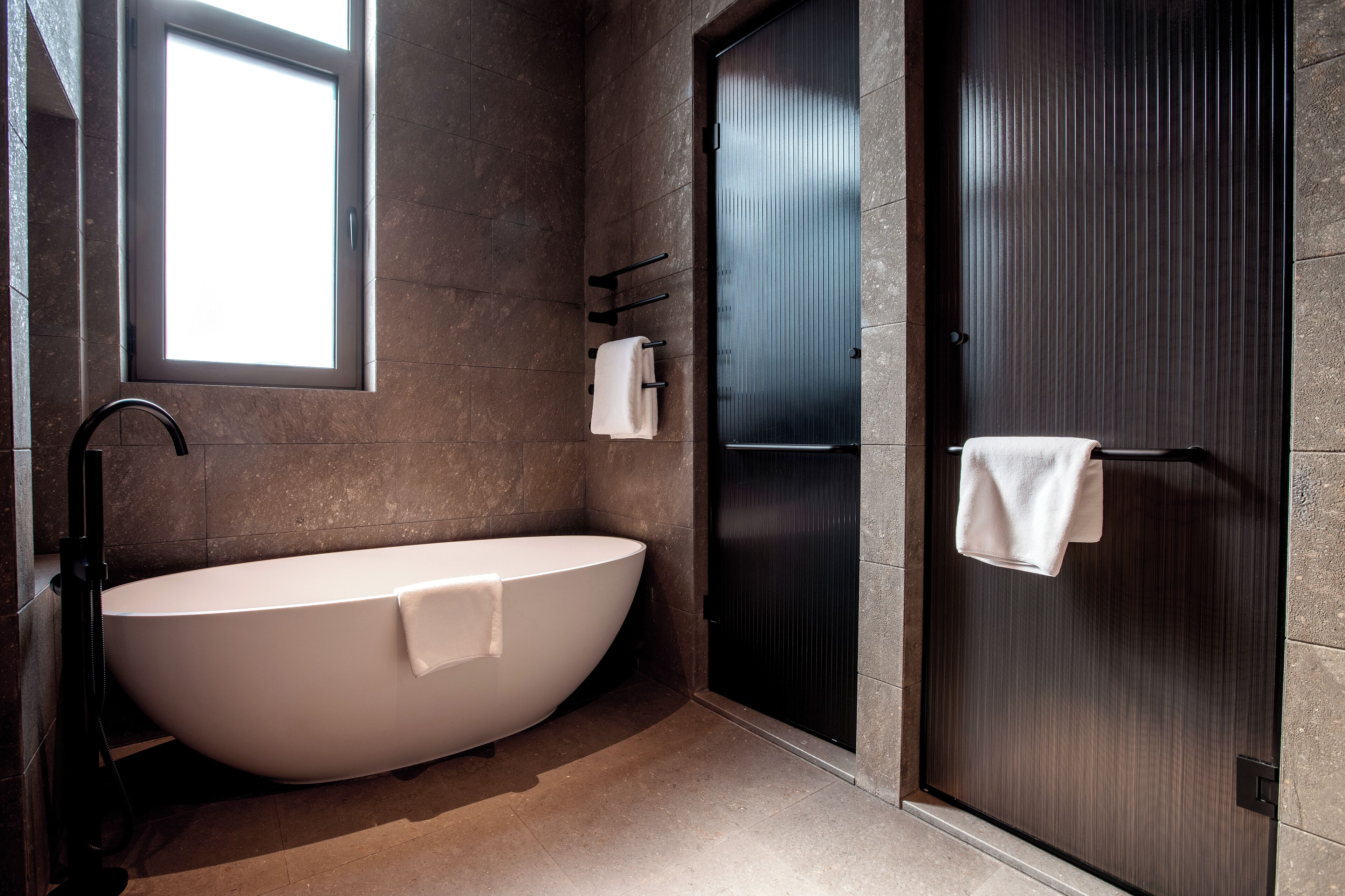 Elite Room | Bathroom | Separate tub and shower, hair dryer, slippers, towels