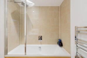 Shower, hair dryer - Serene Scandi Inspired Flat by Tower Bridge (Greater London)