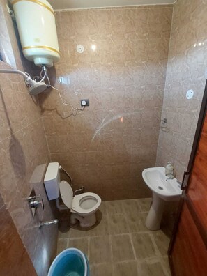 Regadera, jabón, shampoo 