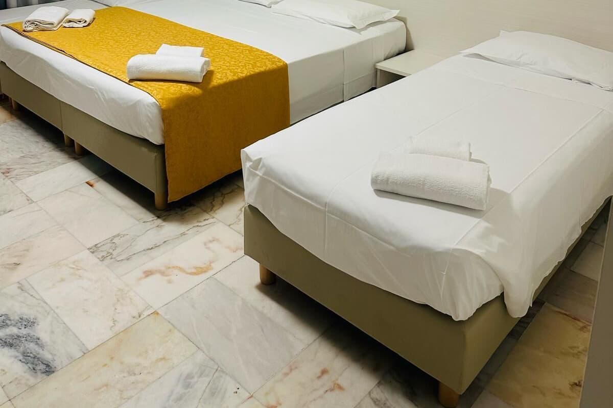 Comfort Quadruple Room, City View | Desk, WiFi (free), bed sheets