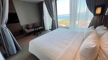 Desk, laptop workspace, blackout curtains, soundproofing