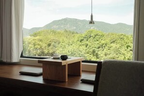 Panoramic Double Room, Courtyard View | Minibar, desk, laptop workspace, blackout drapes - Quanzhou Wuji Homestay (Quanzhou)