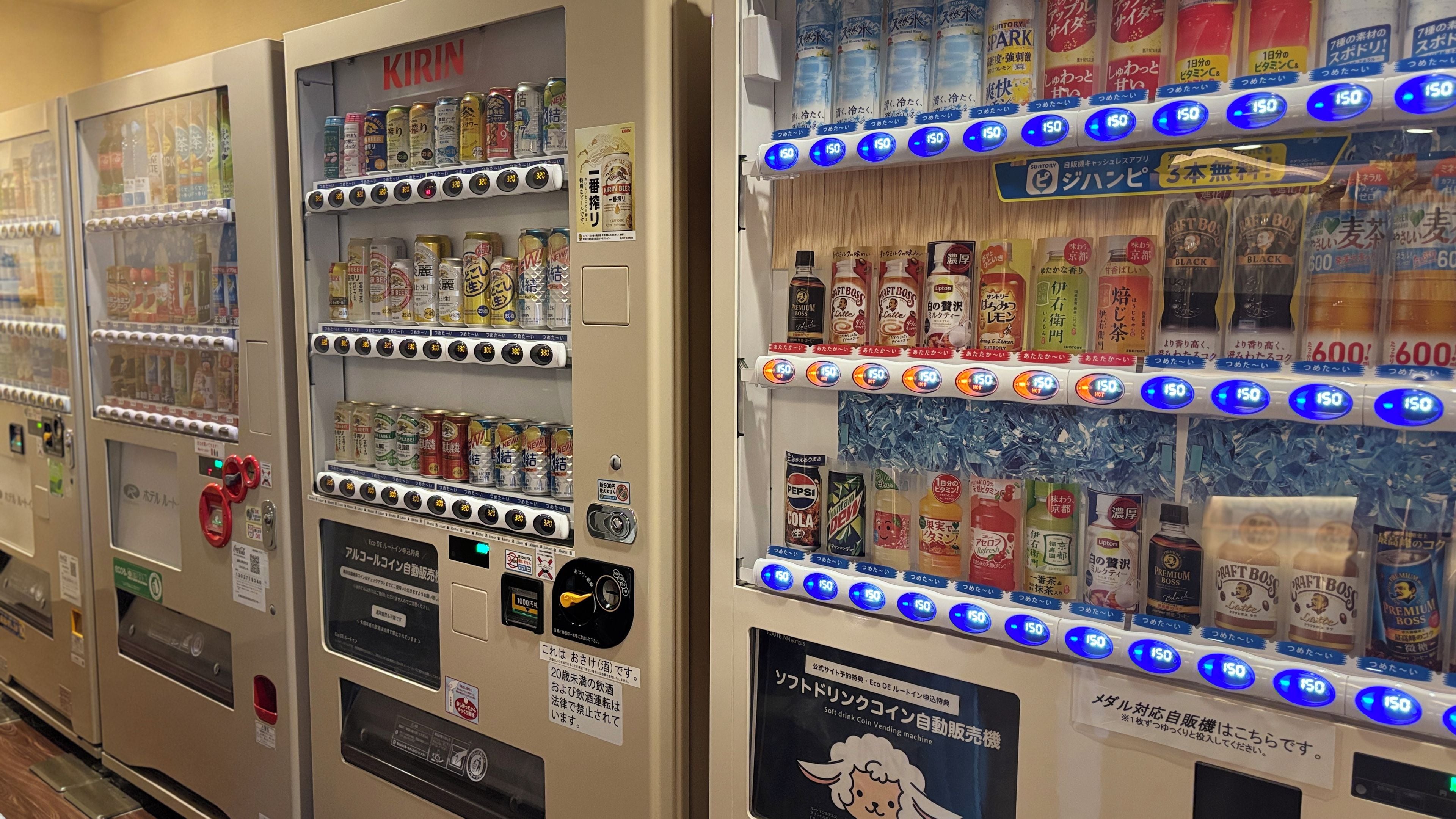 Vending machines with various beverages and snacks.