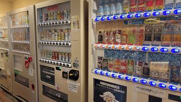 Vending machines with various beverages and snacks.