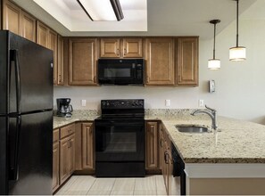 Fridge, microwave, oven, cookware/dishes/utensils