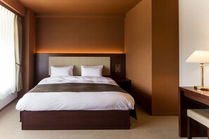 A hotel room with a large bed, a bedside table, a lamp, and a window with curtains. - Nesta Resort Kobe Royal Suite Villa (Miki)