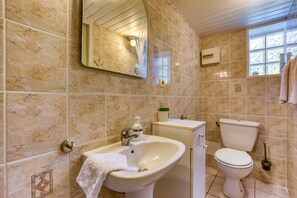 Regadera y amenidades de baño gratuitas 