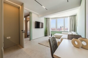 Apartamento superluxo, vista para o mar | Área de estar
