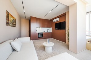 Apartamento superluxo, vista para o mar | Área de estar