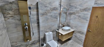 Ducha, artículos de tocador gratuitos, toallas, jabón