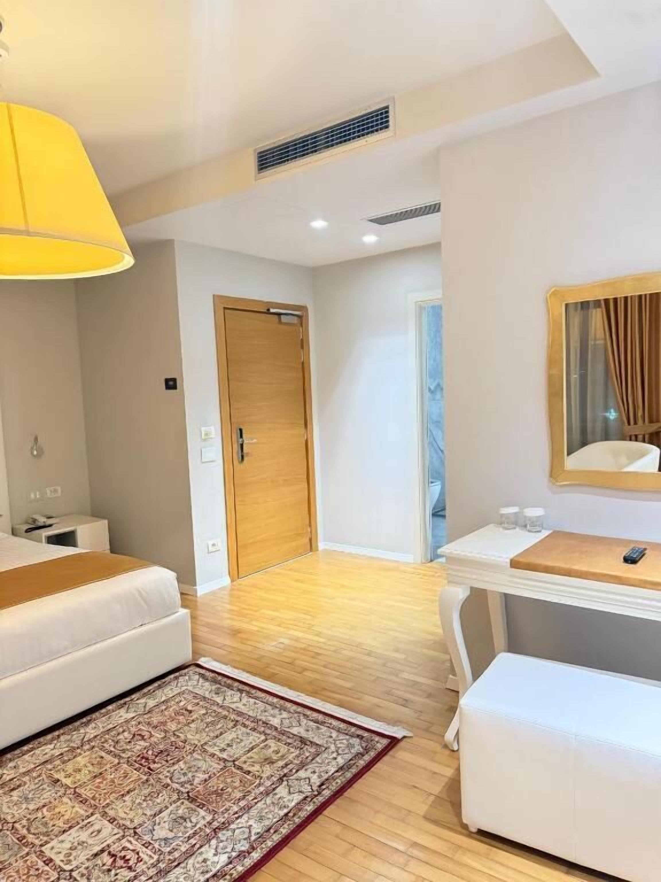 Deluxe Double Room, Balcony, City View | In-room safe, desk, laptop workspace, soundproofing