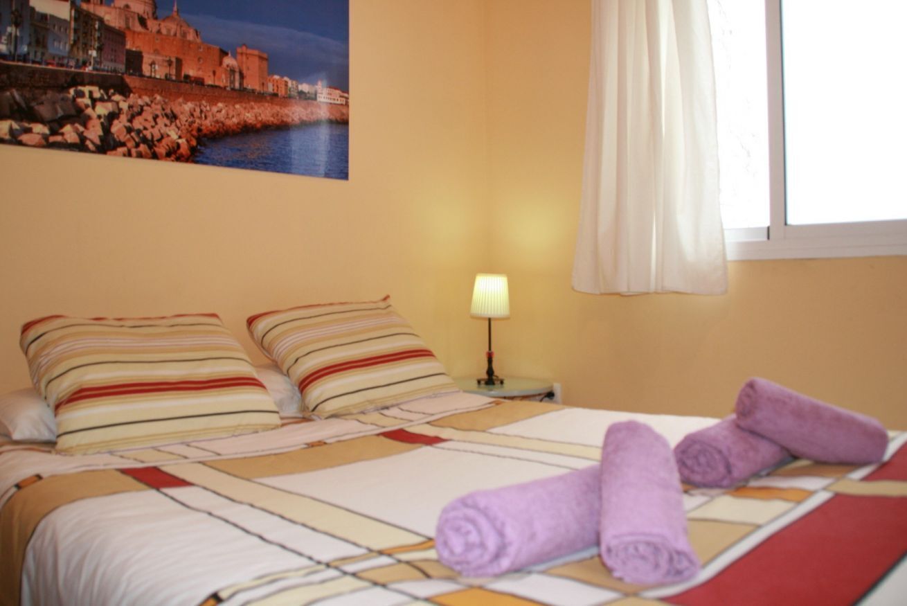 Desk, iron/ironing board, travel crib