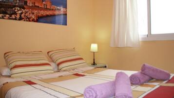 Desk, iron/ironing board, travel crib