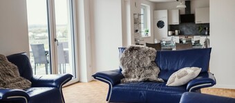 Holiday Apartment 'Schwalbenflug' with Shared Garden, Balcony & Stunning Views