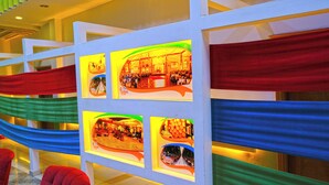 A hotel interior with a reception area, a dining area, and a bar. - Divanyolu Otel (Şanlıurfa)