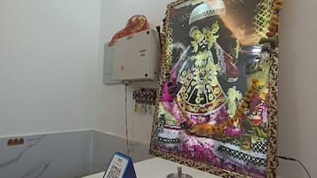 Premium bedding, desk, laptop workspace, soundproofing