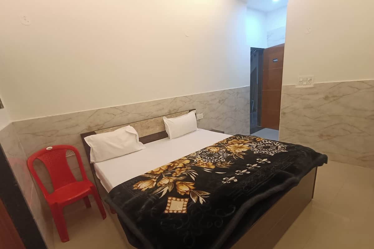 Premium bedding, desk, laptop workspace, soundproofing