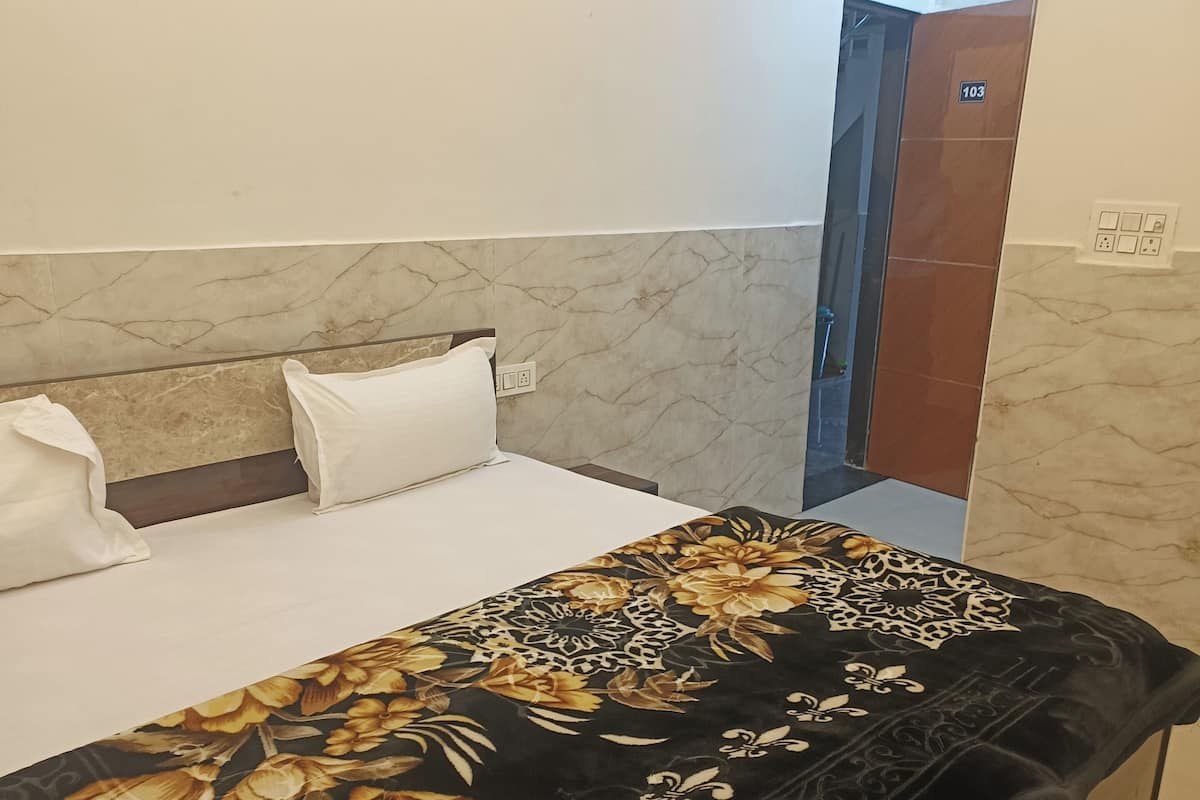 Premium bedding, desk, laptop workspace, soundproofing