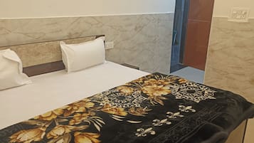 Premium bedding, desk, laptop workspace, soundproofing