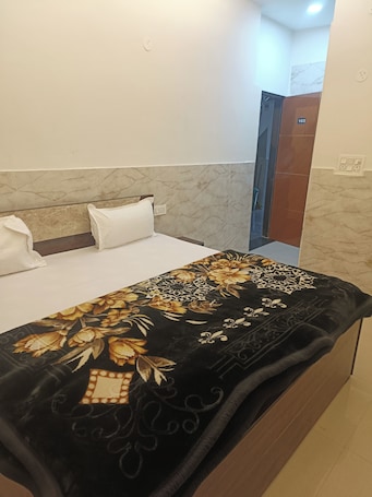 Premium bedding, desk, laptop workspace, soundproofing