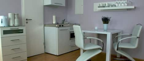 Fridge, microwave, coffee/tea maker, toaster