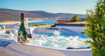 Family and child-friendly 5* villa with pool, games and fitness room
