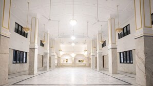 A spacious hall with marble floors, white walls, and gold accents. - Gangabagh by Divine Trails - Hotel Near Har Ki Pauri, Haridwar (Haridwar)