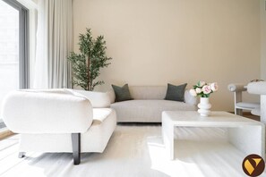 Living area - Vogue, JVC Jeewar near Circle Mall Pool & Gym (Dubai)