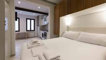 1 chambre, fer et planche Ă repasser