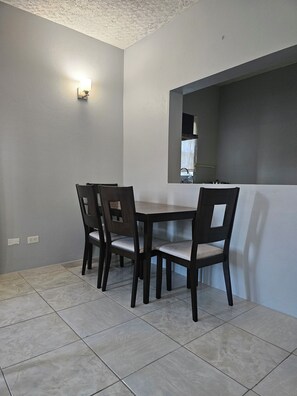 Premium Suite, Kitchen, Garden View | Dining room - Anne's Apartments  (Osbourn)