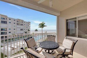 Outdoor dining - Leonardo Arms 317 Beachfront 2B/2B Vacation Condo! Heated Pool! (Fort Myers Beach)