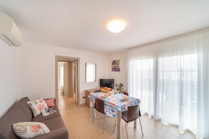 Apartment, 1 Bedroom, Balcony | Dining - Super Villaggio Planetarium Resort B4 one Bedroom Apartment Sleeps 4 Persons (San Michele al Tagliamento)