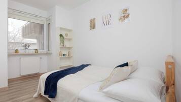 Iron/ironing board, travel crib, WiFi, bed sheets