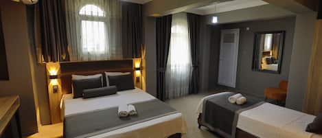 Standard Triple Room, Balcony, City View | Desk, laptop workspace, free WiFi