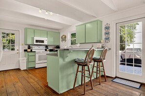 Fridge, microwave, oven, stovetop - Expansive Family Beach Estate 4 Min Walk to Beach by Tybee Cottages (Savannah)